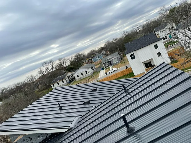 Standing seam metal roof panels with vents for Skylight Repair in Grass Lake